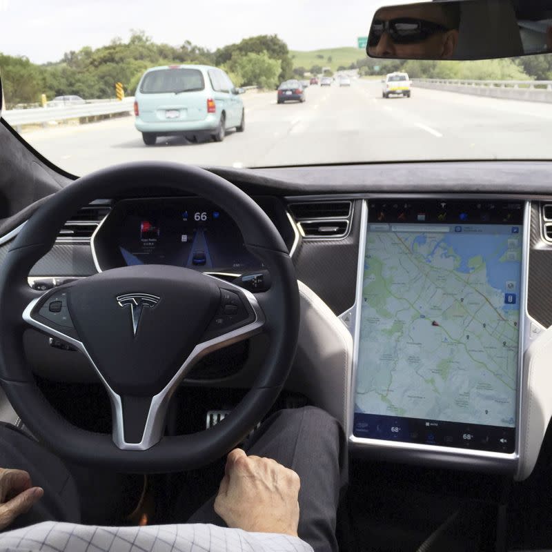 FILE PHOTO: The interior of a Tesla Model S is shown in autopilot mode in San Francisco