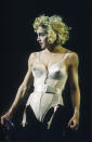 <p>Arguably her most iconic look of all time, this Jean Paul Gaultier cone bra corset was debuted during Madonna’s ‘Blonde Ambition’ tour. <em>[Photo: Getty]</em> </p>