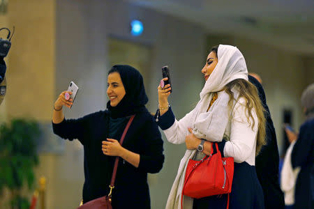 FILE PHOTO: Saudi people attend the concert of composer Yanni at Princess Nourah bint Abdulrahman University in Riyadh, Saudi Arabia December 3, 2017. REUTERS/Faisal Al Nasser/File Photo