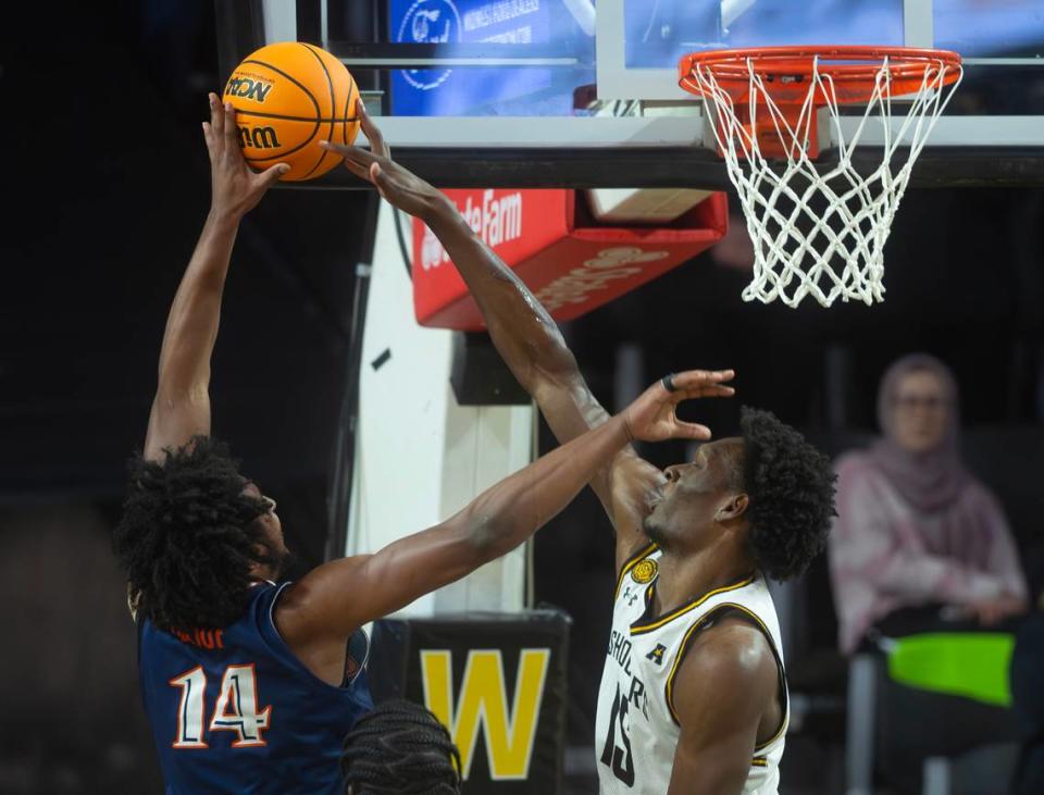 Wichita State’s Quincy Ballard blocks the shot of UTSA’s Massal Diouf in the second half of Wednesday night’s game.