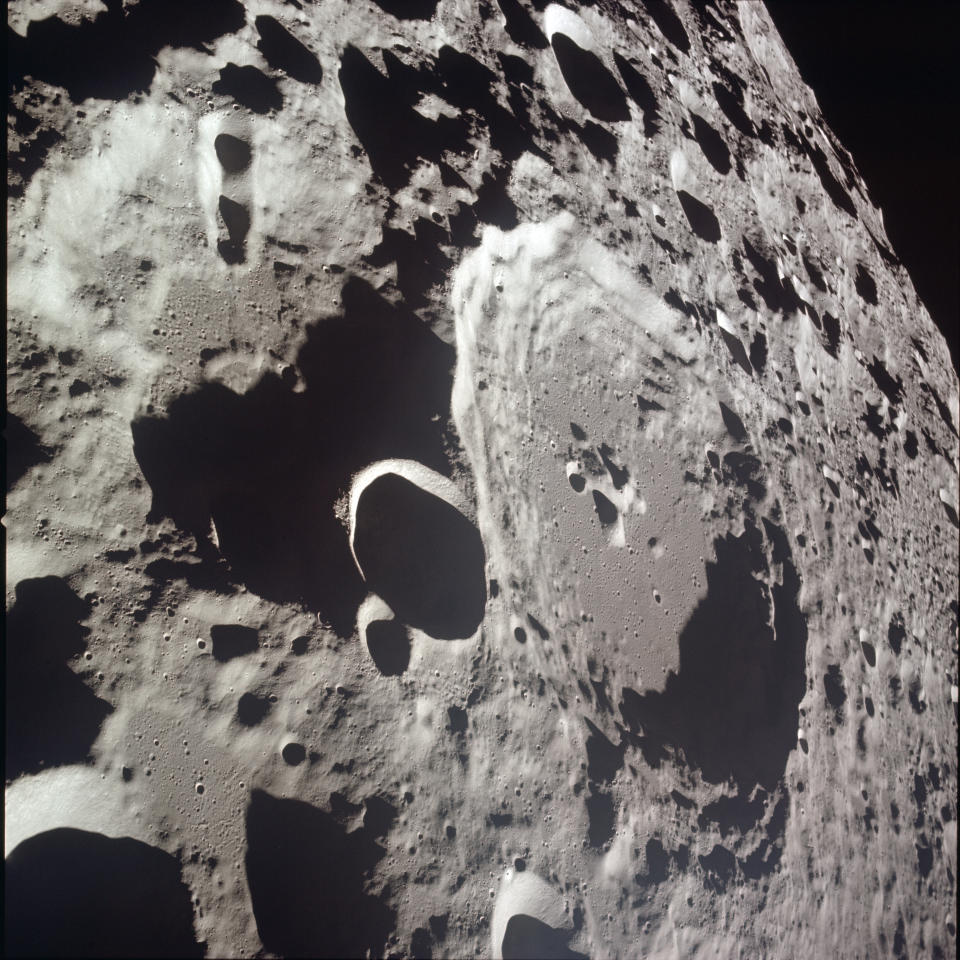 This July 20, 1969 photo made available by NASA shows crater Daedalus and Daedalus B, center left, during the Apollo 11 mission to reach the surface of the moon. (NASA via AP)