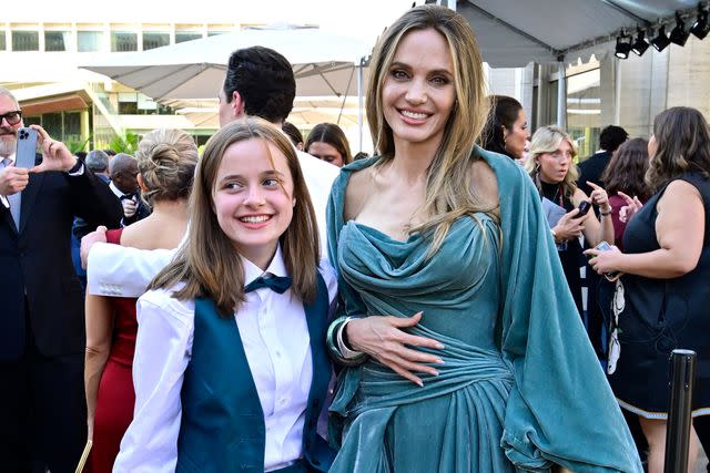 <p>Eugene Gologursky/Getty</p> Vivienne (left) and Angelina Jolie at the 2024 Tonys