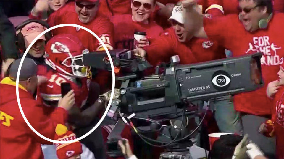 Tyreek Hill commandeered a broadcast camera to celebrate a touchdown in the NFL. Pic: NFL