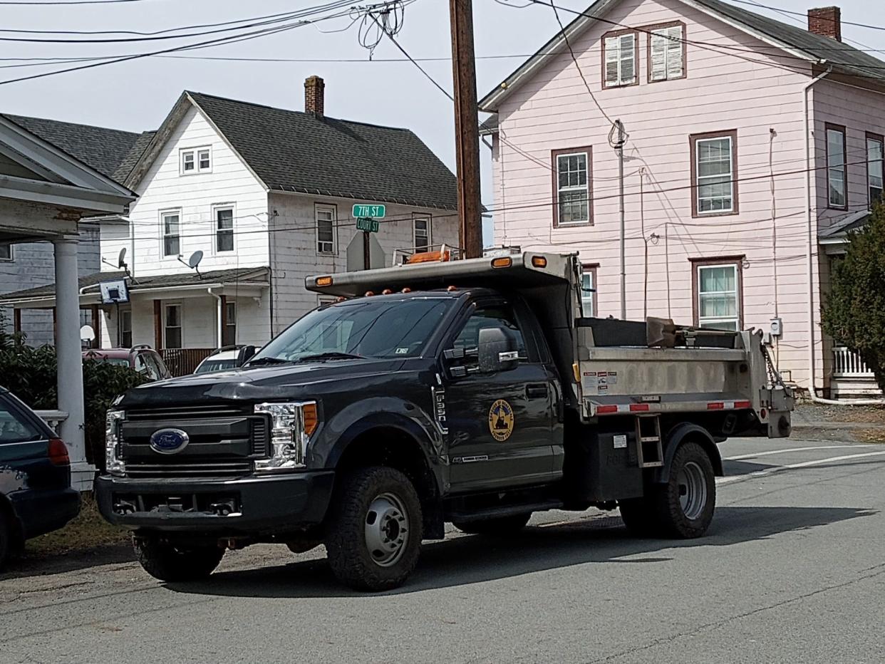 A Department of Public Works truck is pictured at a job site at the corner of 7th and Court streets in Honesdale in March.