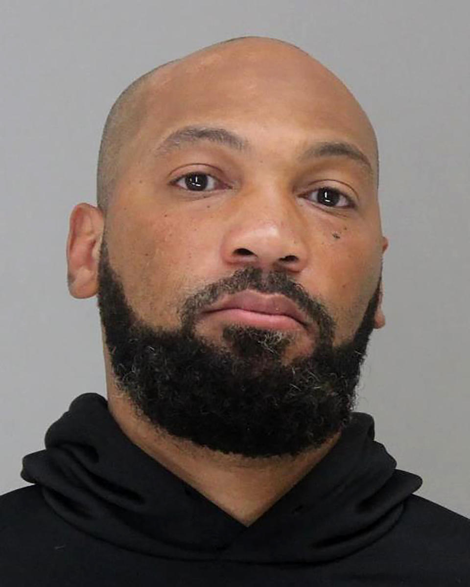 This booking photo released by the Dallas County Sheriff's Department, shows Yaqub Salik Talib on Monday, Aug. 15, 2022. Talib, the brother of retired NFL cornerback Aqib Talib, turned himself in to authorities Monday after police identified him as the suspect in the shooting death of a coach at a youth football game in Texas. (Dallas County Sheriff's Department via AP)