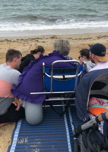 Michelle, from Shepparton, was diagnosed with breast cancer in 2017 but was granted her dying wish for one final visit to the beach with her children. Source: Ambulance Victoria