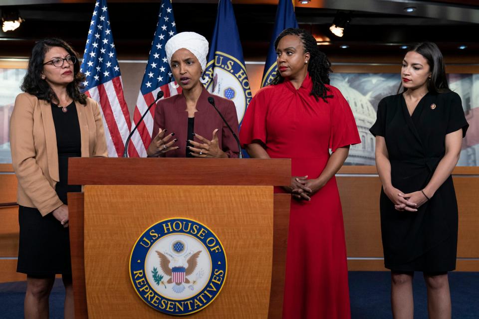 From left, U.S. Reps. Rashida Tlaib, D-Mich., Ilhan Omar, D-Minn., Ayanna Pressley, D-Mass., and Alexandria Ocasio-Cortez, D-N.Y., respond Monday to remarks by President Donald Trump after he called for four Democratic congresswomen of color to go back to their 