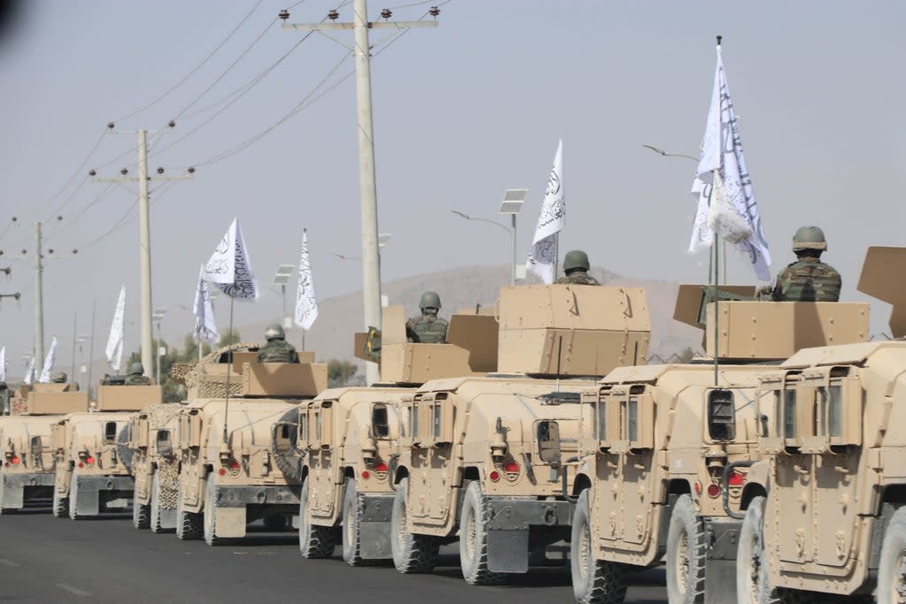 Taliban security patrol to show their military might during a parade in Kandahar this week (EPA)