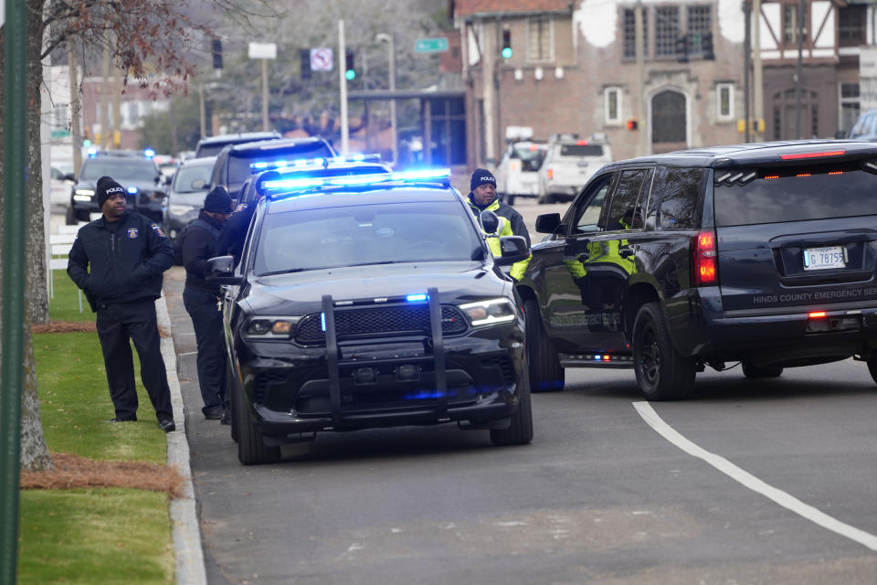 Capitol Police respond to a bomb threat at the Mississippi State Capitol in Jackson, Miss., Wednesday morning, Jan. 3, 2024. The building was emptied, the grounds cleared of vehicles as officers investigated. (AP Photo/Rogelio V. Solis)