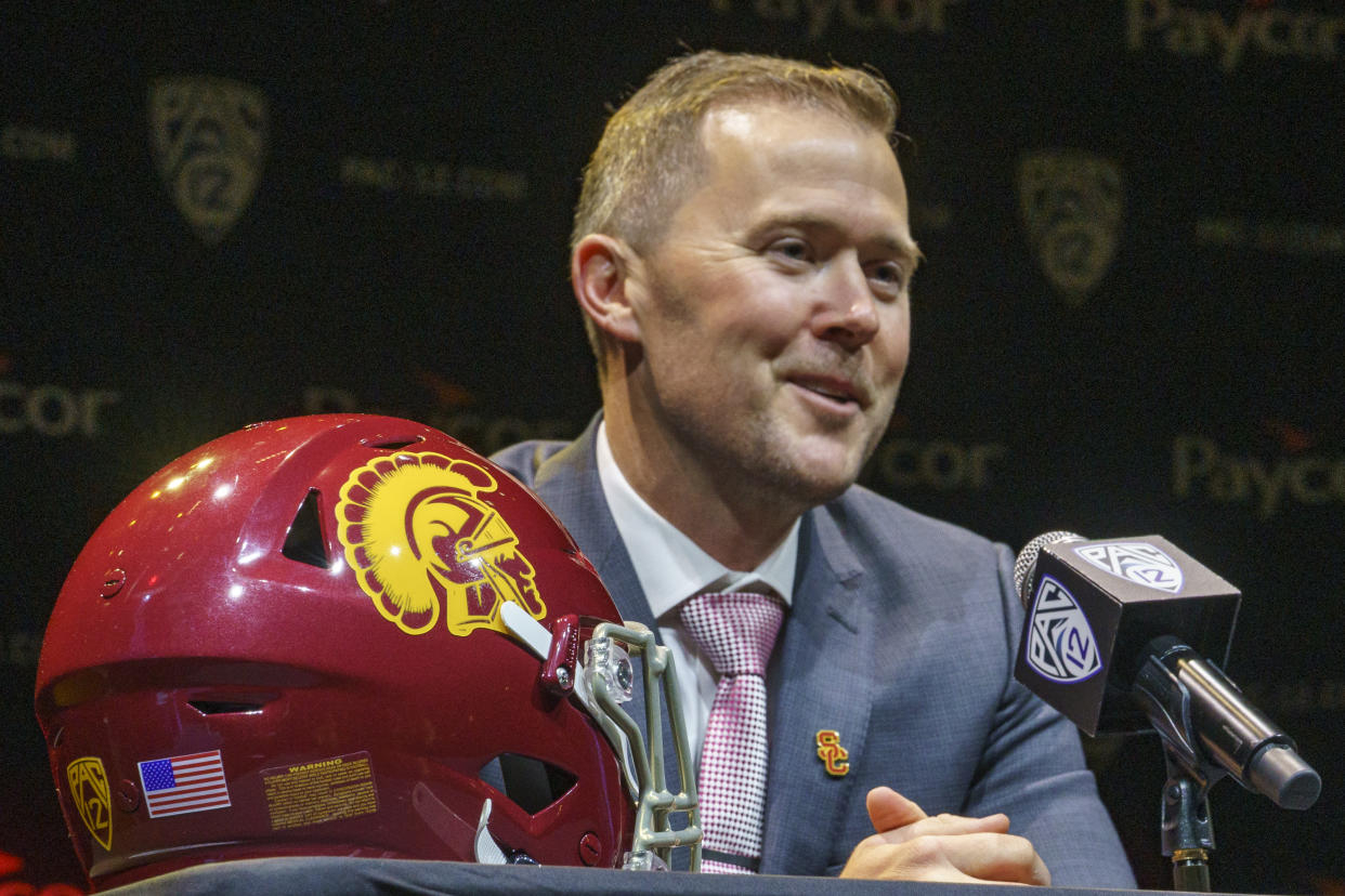 USC coach Lincoln Riley speaks brings sky-high expectations to the program in his first year at the helm. Can he live up to the hype? (AP Photo/Damian Dovarganes)