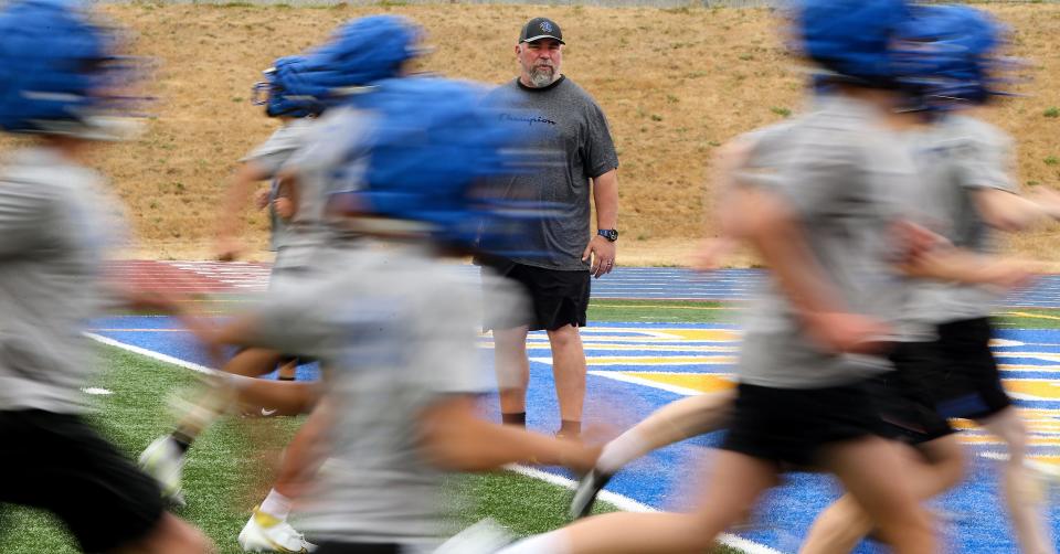 Bremerton football coach Paul Theriault and six local players recently spend a portion of spring break on a tour of small college programs in California and Oregon.