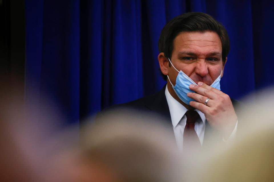 Florida Governor Ron DeSantis (R-FL) wipes his nose before taking his seat during an Operation Warp Speed Vaccine Summit at the White House in Washington, U.S., December 8, 2020. (Tom Brenner/Reuters)