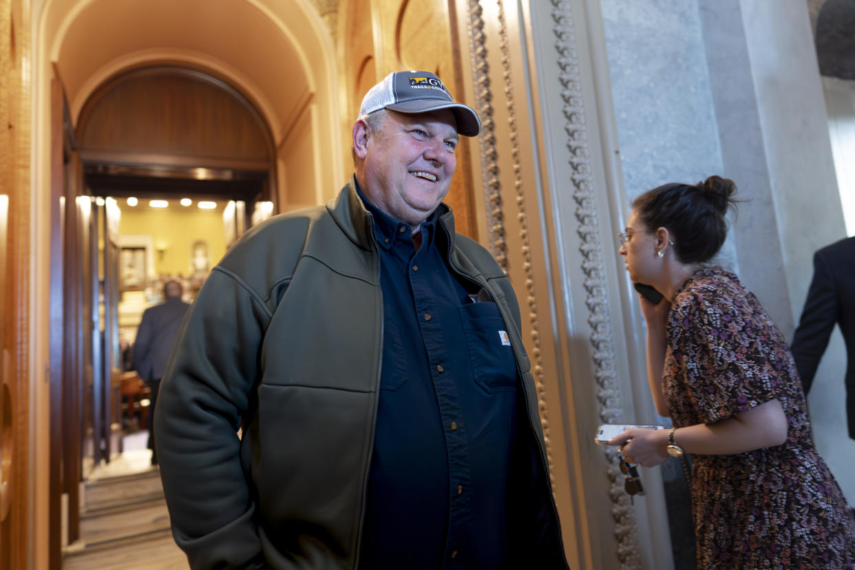 FILE - Sen. Jon Tester, D-Mont., leaves the chamber as the Senate prepares to advance the $95 billion aid package for Ukraine, Israel and Taiwan passed by the House, at the Capitol in Washington, Tuesday, April 23, 2024. (AP Photo/J. Scott Applewhite, File)