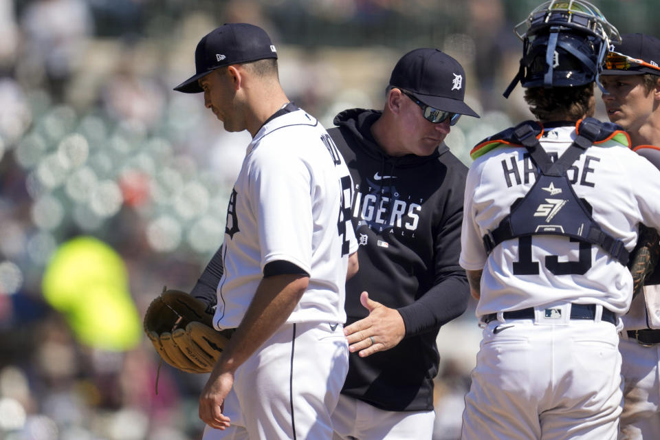 Detroit Tigers manager A.J. Hinch takes the ball from pitcher Matthew Boyd in the fifth inning of a baseball game against the Boston Red Sox in Detroit, Sunday, April 9, 2023. (AP Photo/Paul Sancya)