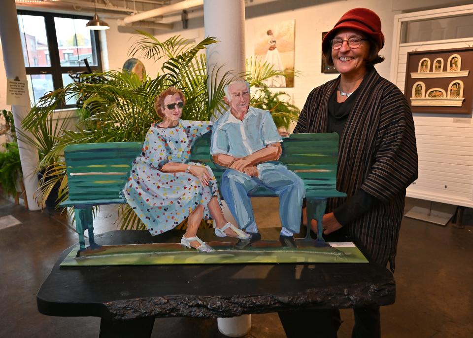 "AURA" exhibit artist Madeleine Lord of Dudley with 'Bench Couple' at The White Room.