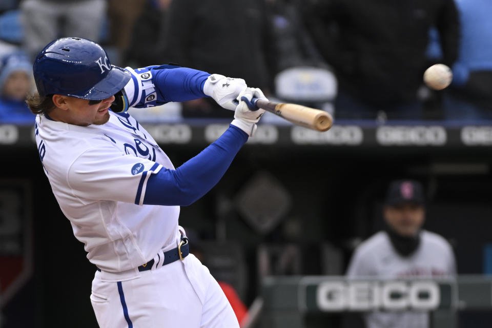 Kansas City Royals' Bobby Witt Jr. hits an RBI double against the Cleveland Guardians during the eighth inning of a baseball game Thursday, April 7, 2022, in Kansas City, Mo. (AP Photo/Reed Hoffmann)