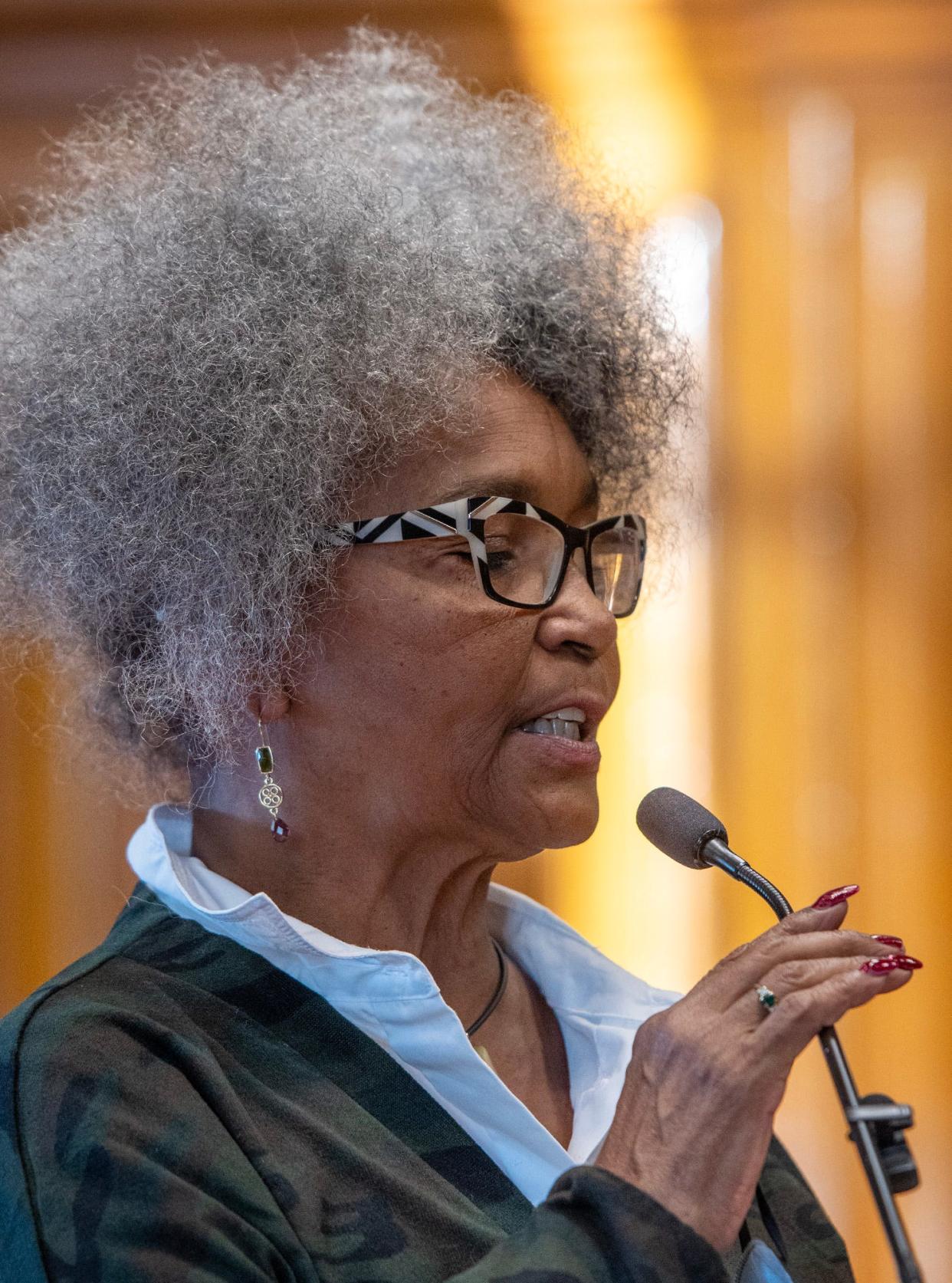Sharon Henderson of Westborough reads a section of the Frederick Douglass speech, "What to the slave is the Fourth of July?" The speech was read in sections at City Hall Tuesday.
