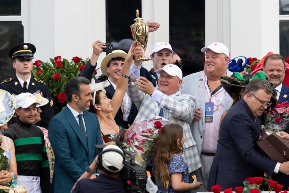 Kenny McPeek, the trainer for Mystik Dan, celebrates winning the 150th running of the Kentucky Derby.