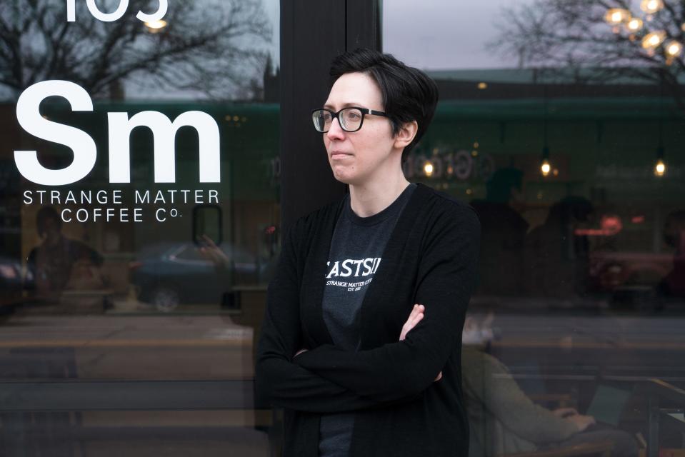 Fostering a community space drives Cara Nader, seen here, and wife Elaine Barr, who created Strange Matter Coffee, with multiple coffee shops in Lansing, Michigan.