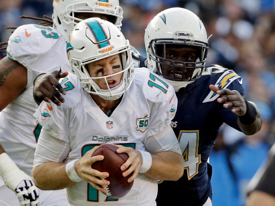 Melvin Ingram, then with the Chargers, sacks Miami's Ryan Tannehill in 2015.