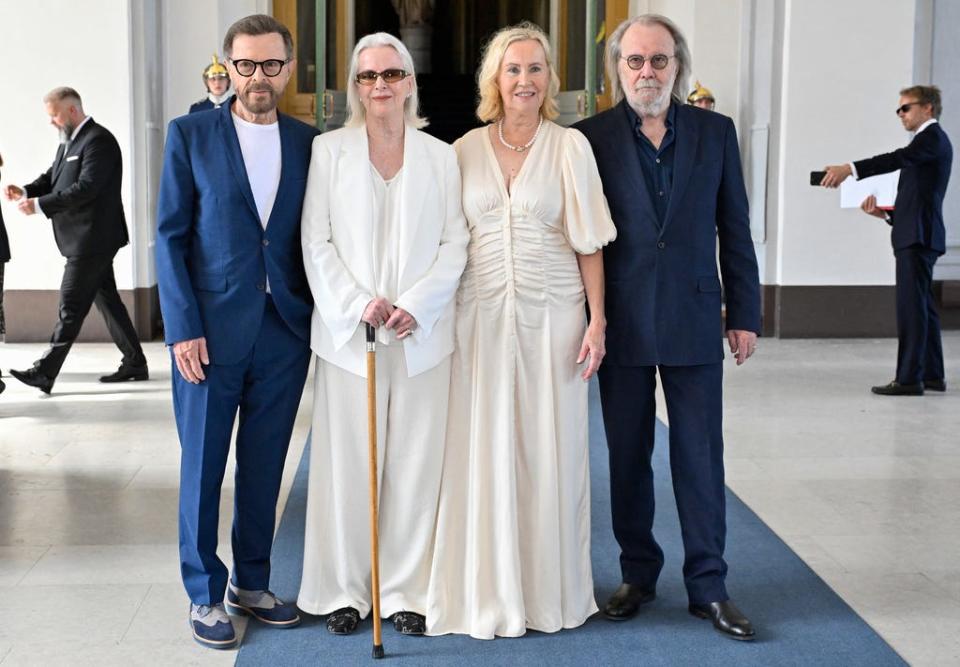 A reunited ABBA (Bjorn Ulvaeus, from left, Anni-Frid Lyngstad, Agnetha Faltskog and Benny Andersson) pose for a photo after the received the Royal Vasa Order from Sweden's king and queen during a ceremony at Stockholm Royal Palace on May 31, 2024.