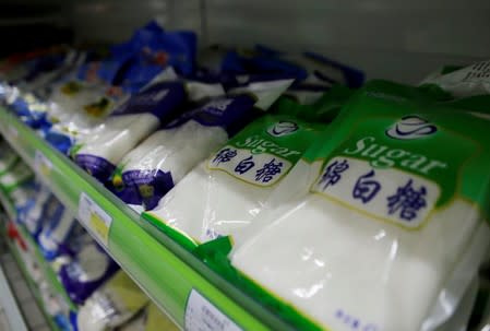 White sugar products are placed for sale at a supermarket in Beijing