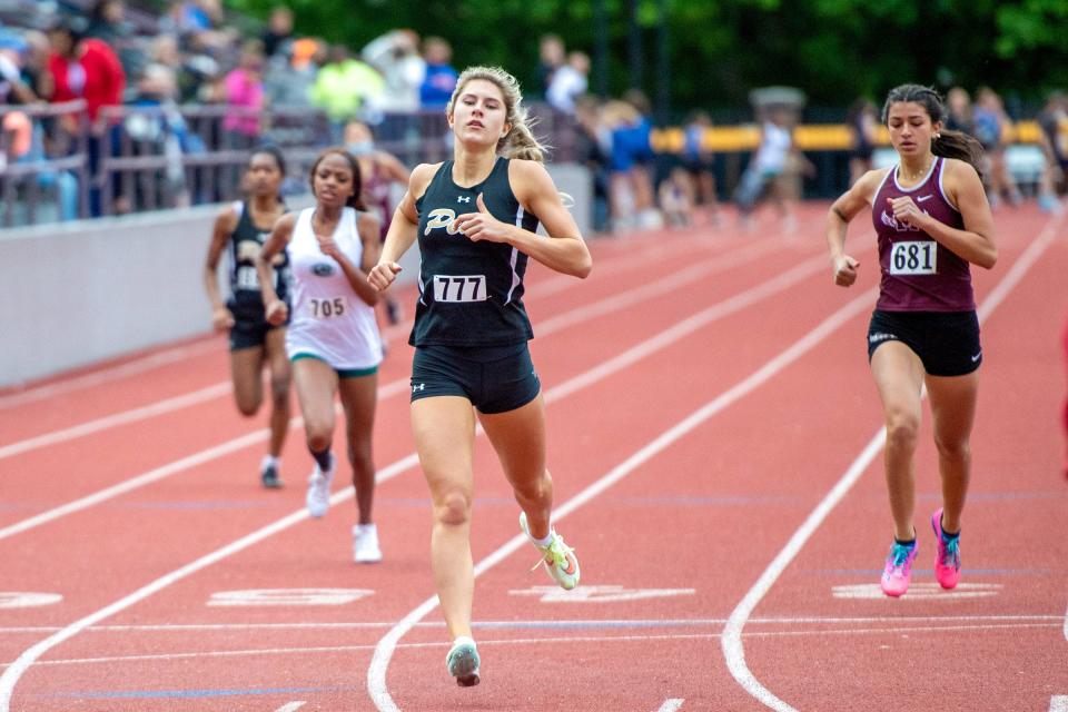 Penn’s Julia Economou wins the 400 meter dash at the Mishawaka Girls IHSAA Sectional track meet Tuesday, May 17, 2022, at Mishawaka High School.