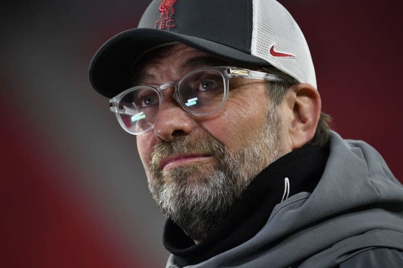 Liverpool coach Juergen Klopp stands in the stadium before the start of the UEFA Champions League soccer match between RB Leipzig and FC Liverpool in Puskas Arena. Former captain of the German national soccer team Michael Ballack said that Juergen Klopp would be the ideal Germany coach because he "symbolisises all German attitudes" and "the people would love it". Marton Monus/dpa