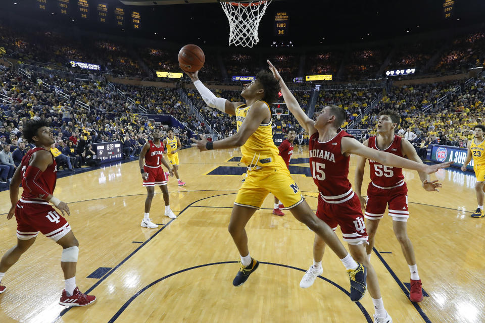 Michigan guard Jordan Poole (2) drives against Indiana in the first half of an NCAA college basketball game in Ann Arbor, Mich., Sunday, Jan. 6, 2019. (AP Photo/Paul Sancya)