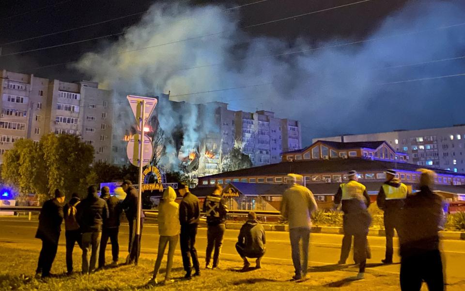 A view shows a site of a plane crash on residential building in the southern city of Yeysk -  REUTERS