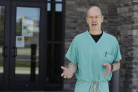 Dr. Wayne Perry, chief of staff at Decatur County Memorial Hospital, speaks in front of his office, Thursday, April 2, 2020, in Greensburg, Ind. (AP Photo/Darron Cummings)