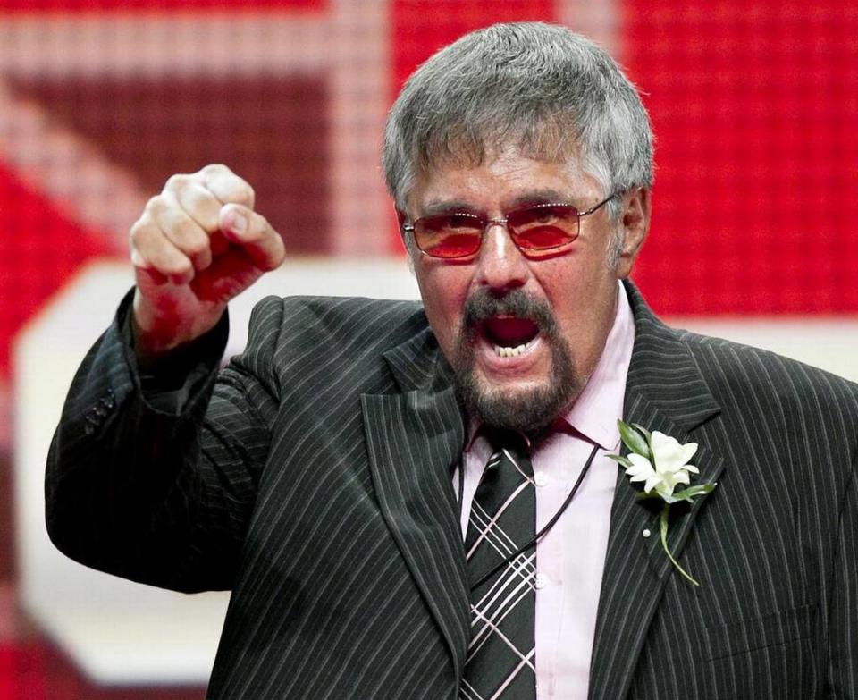 N.C. State quarterback Roman Gabriel lets out a yell as he is inducted into the the N.C. State Athletic Hall of Fame on Friday October 5, 2012 at Reynolds Coliseum in Raleigh, N.C.