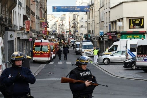 Two killed in fierce police raid targeting Paris attack commander