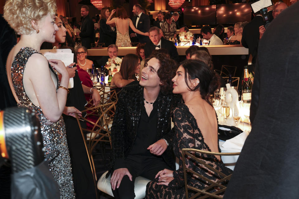 Julia Garner, Timothée Chalamet and Kylie Jenner at the 81st Golden Globe Awards held at the Beverly Hilton Hotel on January 7, 2024 in Beverly Hills, California. (Photo by Christopher Polk/Golden Globes 2024/Golden Globes 2024 via Getty Images)