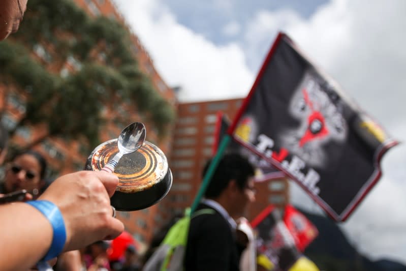 Demonstrators take part in a protest as a national strike continues in Bogota