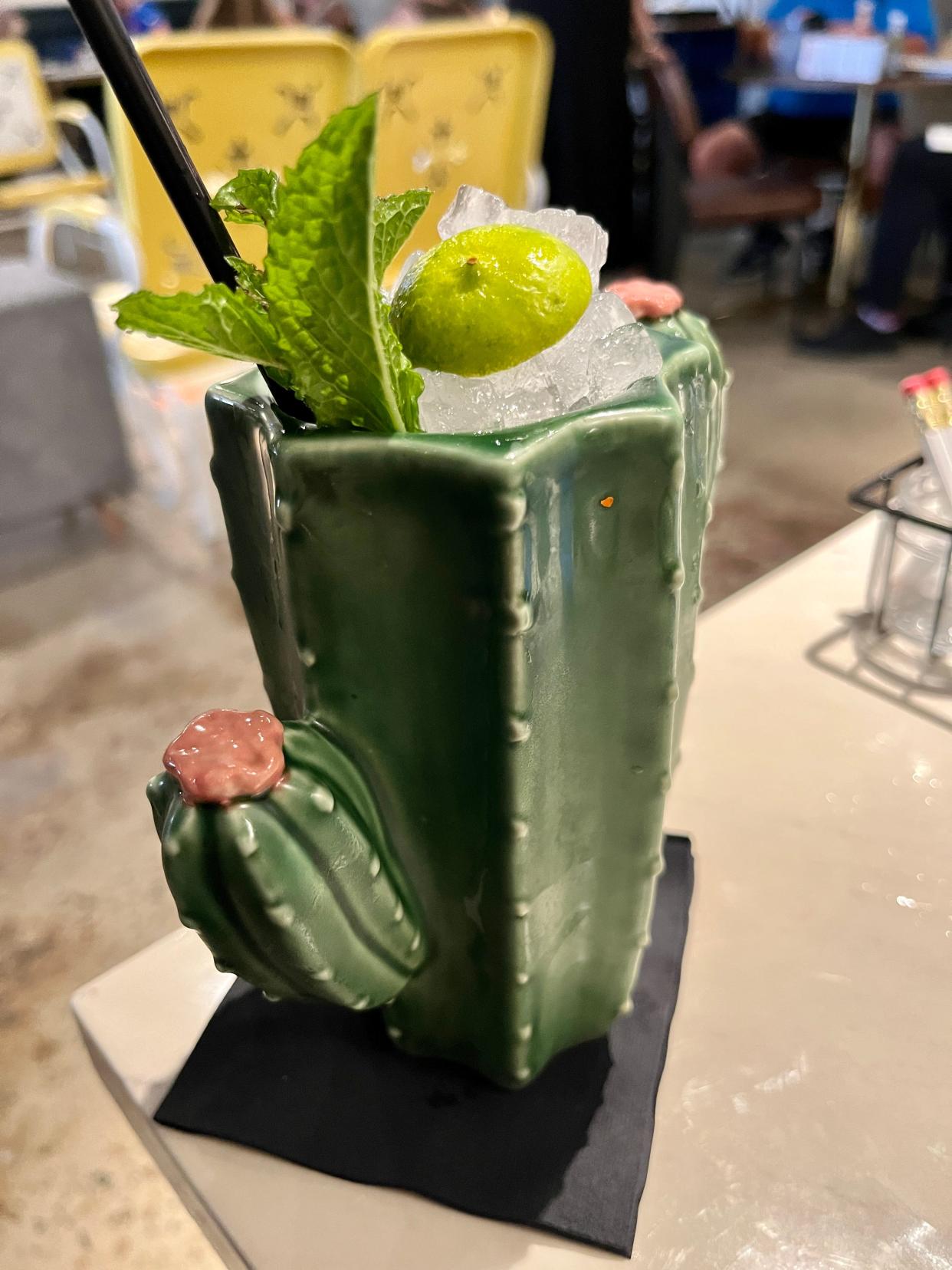 Tacocat's "Desert Daq" cocktail is made with Mexican rum, aloe, muskmelon, mint, Key and Persian lime juices.