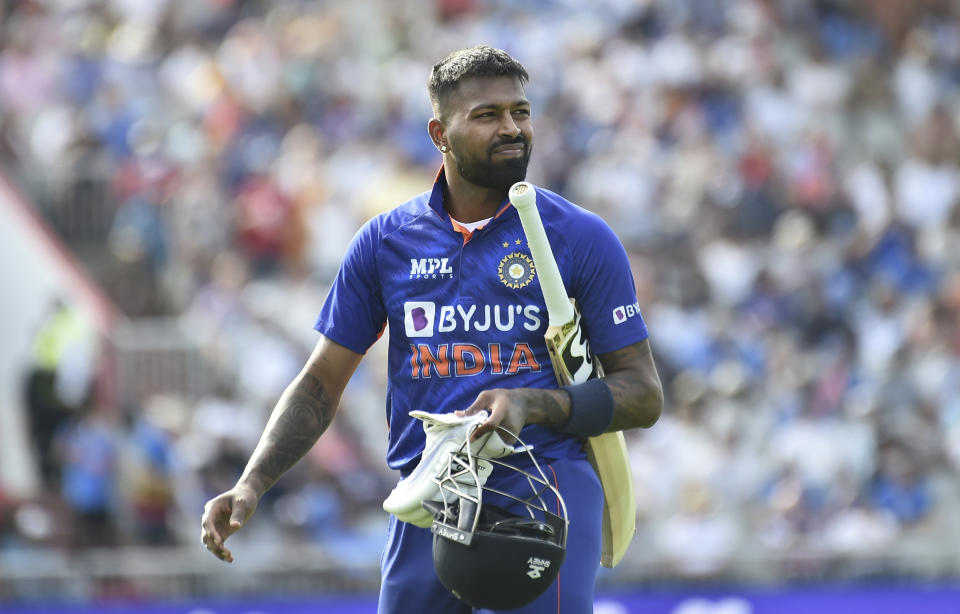 India's Hardik Pandya, returns to the pavilion after being dismissed by England's Brydon Carse during the third one day international cricket match between England and India at Emirates Old Trafford cricket ground in Manchester, England, Sunday, July 17, 2022. (AP Photo/Rui Vieira)