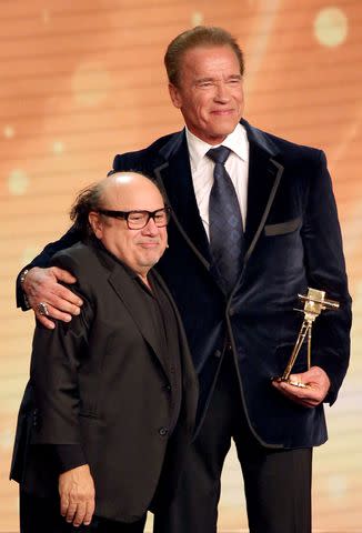 <p>Christian Charisius/picture alliance via Getty</p> Danny DeVito and Arnold Schwarzenegger in 2015