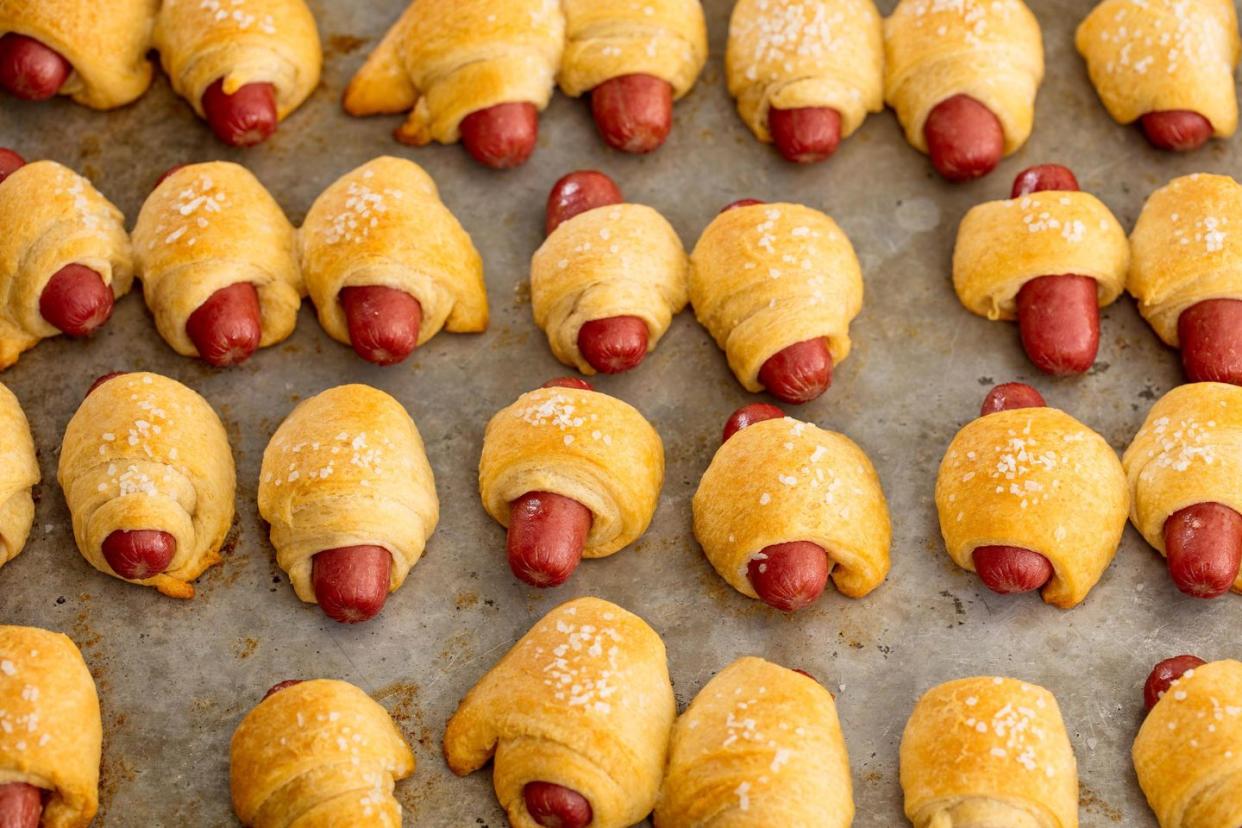 pigs in a blanket on a baking sheet