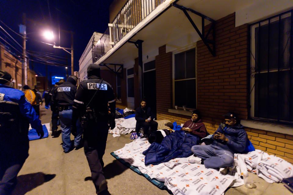 El Paso Police patrol El Paso streets where migrants are staying in front of Sacred Heart Church, on Wednesday, Jan. 4, 2023.