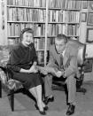 <p>Ed Sullivan and Mrs. John Chapman, co-chairman of the <em>New York Newspaper</em> women's club entertainment committee, have a conversation in the American television personality's apartment at the Delmonico Hotel.</p>