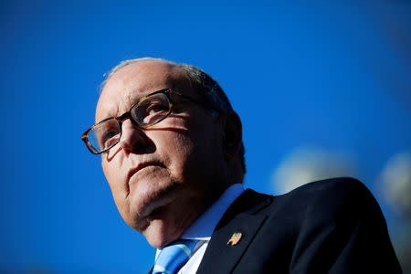 FILE PHOTO: White House economic adviser Larry Kudlow listens to a question from the media outside the White House in Washington, U.S., December 3, 2018. REUTERS/Jim Young/File Photo