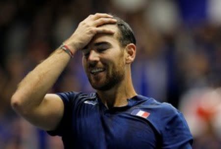 FILE PHOTO: Tennis - Davis Cup - First Round - France vs Netherlands - Halle Olympique, Albertville, France - February 4, 2018 France's Adrian Mannarino celebrates after winning his match against Netherlands' Robin Haase and the First Round for France REUTERS/Emmanuel Foudrot