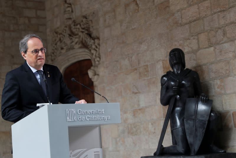 The leader of Catalonia's regional government Quim Torra delivers a statement at Palau de la Generalitat in Barcelona