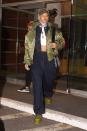 <p>In a Supreme baseball hat, silk scarf, white ribbed crop top, denim jacket and matching oversized jeans, olive puffer jacket and Fenty x Puma boots while out in New York.</p>