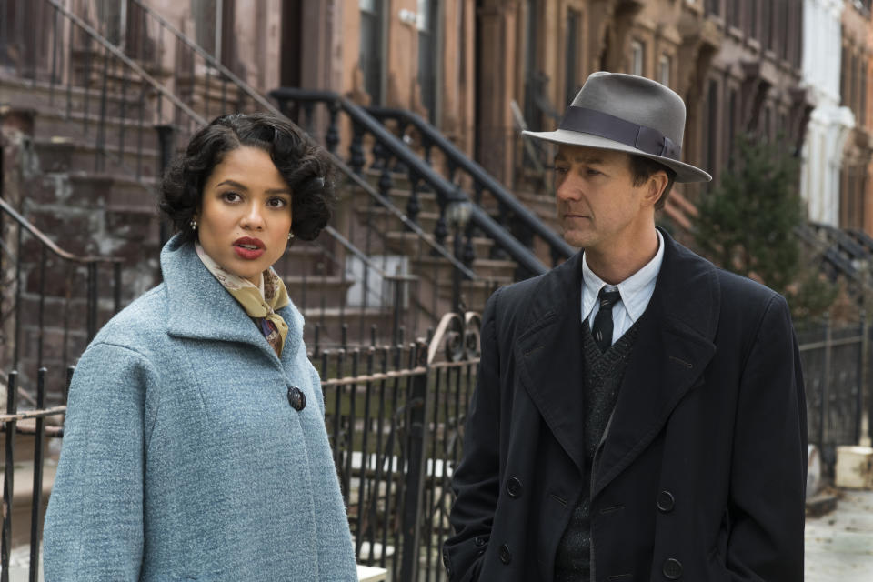 This image released by Warner Bros. shows Gugu Mbatha-Raw, left, and Edward Norton in a scene from "Motherless Brooklyn." (Glen Wilson/Warner Bros. Pictures via AP)