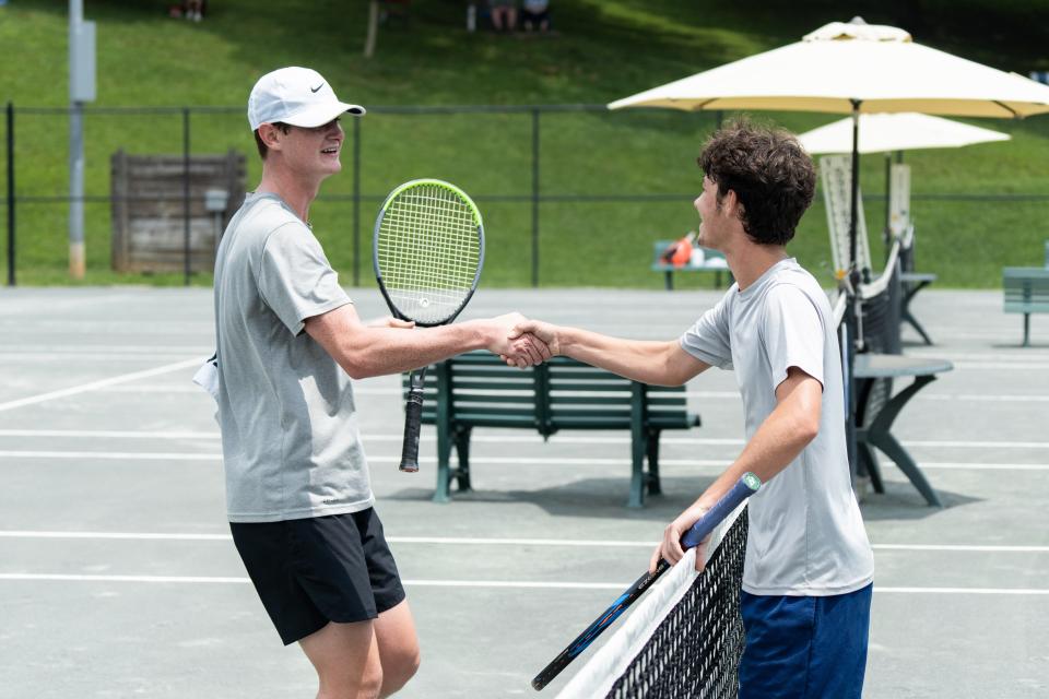 Tennis players compete at the 2021 Asheville Open.