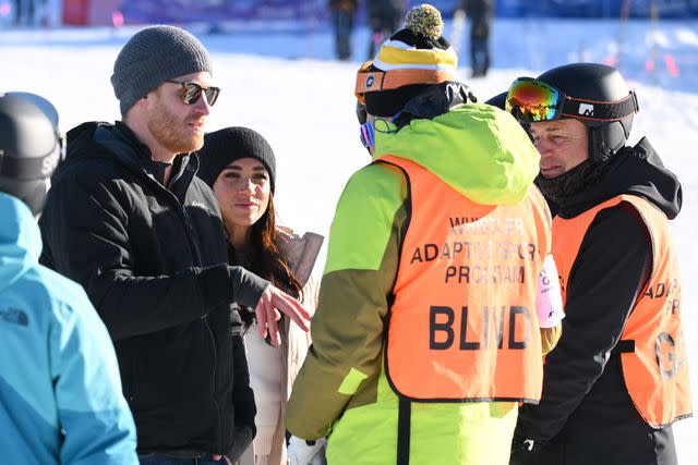 <p>Karwai Tang/WireImage</p> Prince Harry and Meghan Markle attend the Invictus Games Winter Training Camp in Canada on Feb. 14, 2024