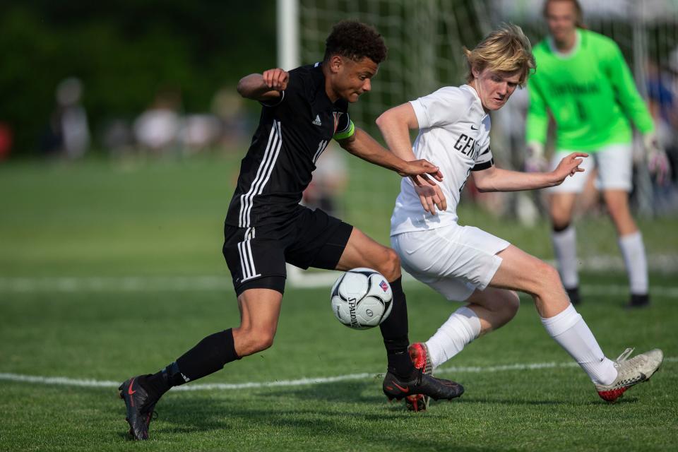 West Des Moines Valley's Tianci Sun and Ankeny Centennial's Evan Larson battle for possession of the ball near the goal during the 2021 Class 3A quarterfinal.