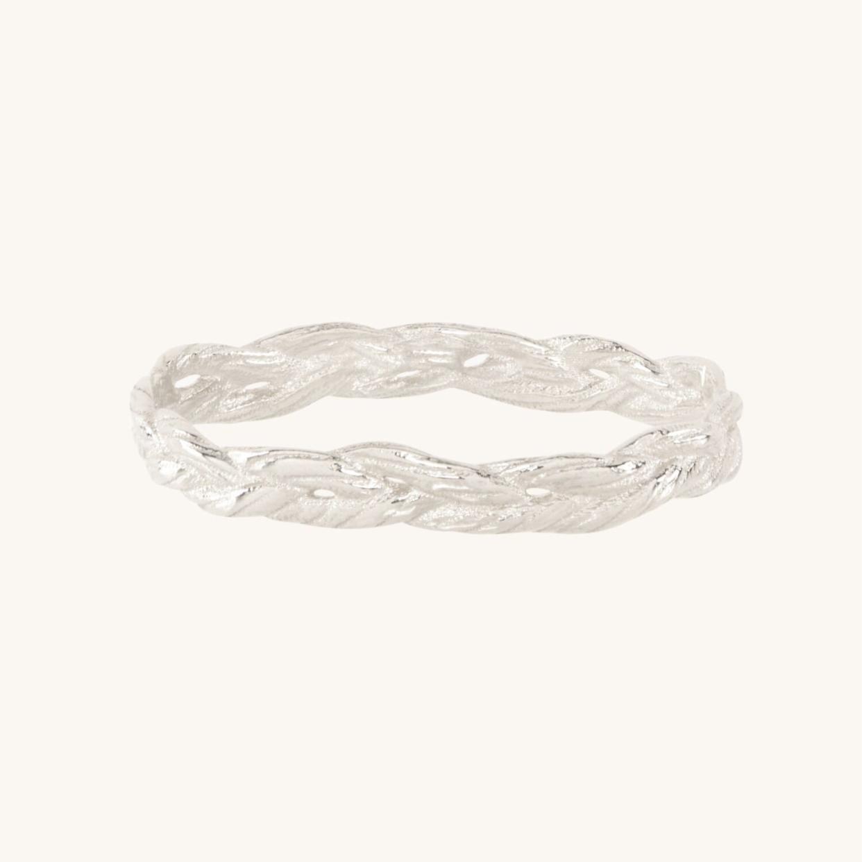 <p><a href="https://go.redirectingat.com?id=74968X1596630&url=https%3A%2F%2Fwww.catbirdnyc.com%2Fentwined-braided-ring-silver.html&sref=https%3A%2F%2Fwww.goodhousekeeping.com%2Flife%2Fentertainment%2Fa60670722%2Fjenny-slate-interview-catbird-jewelry-collection%2F" rel="nofollow noopener" target="_blank" data-ylk="slk:Shop Now;elm:context_link;itc:0;sec:content-canvas" class="link rapid-noclick-resp">Shop Now</a></p><p>Entwined Braided Ring, Silver</p><p>Catbird</p>